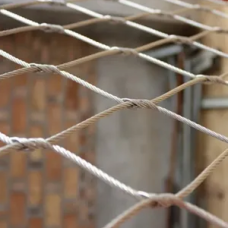 Сетка нержавеющая тросовая с узловым креплением и ромбической ячейкой Н1 7х7 AISI 304 25х43х1 мм